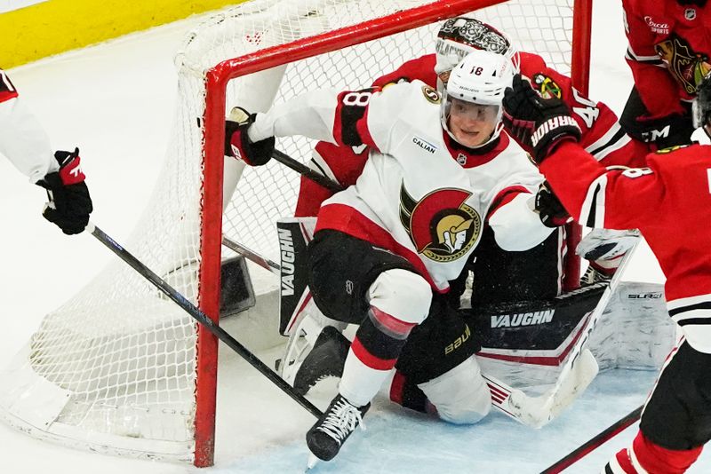 Mar 5, 2025; Chicago, Illinois, USA; Ottawa Senators center Tim Stützle (18) scores the game winning goal on Chicago Blackhawks goaltender Arvid Soderblom (40) during overtime at United Center. Mandatory Credit: David Banks-Imagn Images