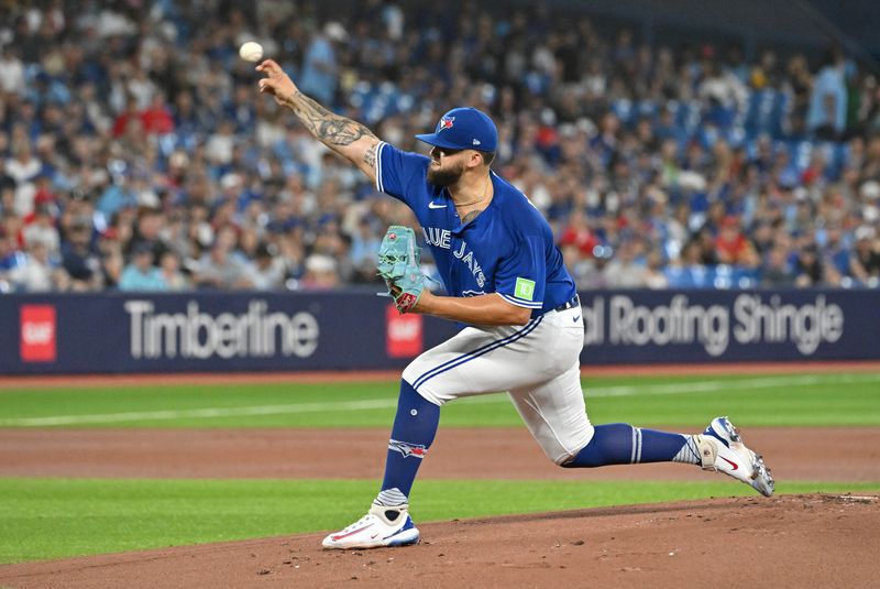 Jul 29, 2023; Toronto, Ontario, CAN; Toronto Blue Jays starting pitcher Alek Manoah (6) delivers a pitch against the Los Angeles Angels in the first inning at Rogers Centre. Mandatory Credit: Dan Hamilton-USA TODAY Sports