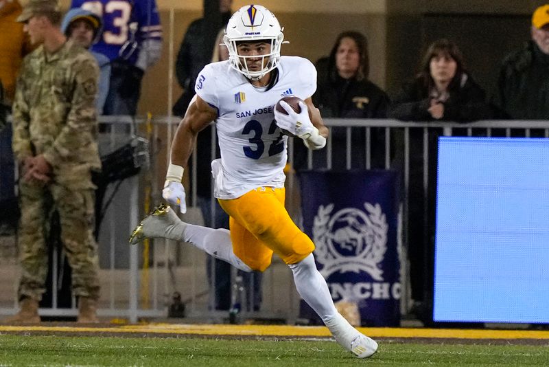 Oct 1, 2022; Laramie, Wyoming, USA; San Jose State Spartans running back Kairee Robinson (32) runs against the Wyoming Cowboys during the third quarter at Jonah Field at War Memorial Stadium. Mandatory Credit: Troy Babbitt-USA TODAY Sports