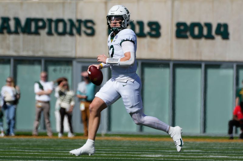 Nov 4, 2023; Waco, Texas, USA;  Baylor Bears quarterback Blake Shapen (12) rolls out to pass against the Houston Cougars during the first half at McLane Stadium. Mandatory Credit: Chris Jones-USA TODAY Sports