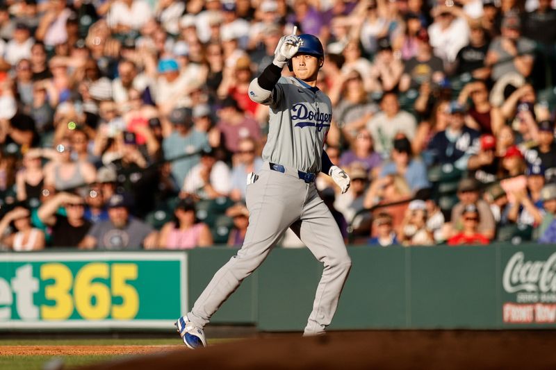 Jun 17, 2024; Denver, Colorado, USA; Los Angeles Dodgers designated hitter Shohei Ohtani (17) gestures after a single in the first inning against the Colorado Rockies at Coors Field. Mandatory Credit: Isaiah J. Downing-USA TODAY Sports