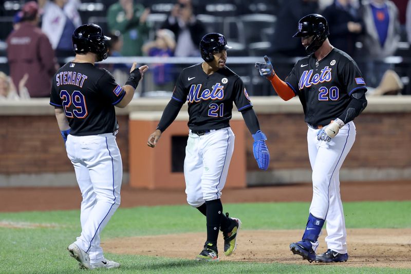 Sep 15, 2023; New York City, New York, USA; New York Mets first baseman Pete Alonso (20) celebrates his three run home run against the Cincinnati Reds with shortstop Francisco Lindor (12) and right fielder DJ Stewart (29) during the sixth inning at Citi Field. Mandatory Credit: Brad Penner-USA TODAY Sports