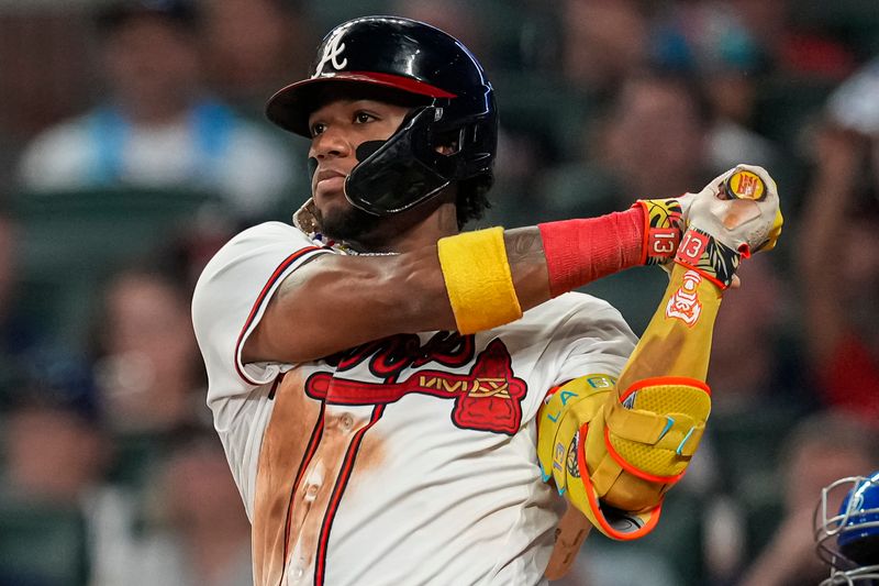 Aug 22, 2023; Cumberland, Georgia, USA; Atlanta Braves right fielder Ronald Acuna Jr. (13) hits a ground rule double against the New York Mets during the eighth inning at Truist Park. Mandatory Credit: Dale Zanine-USA TODAY Sports