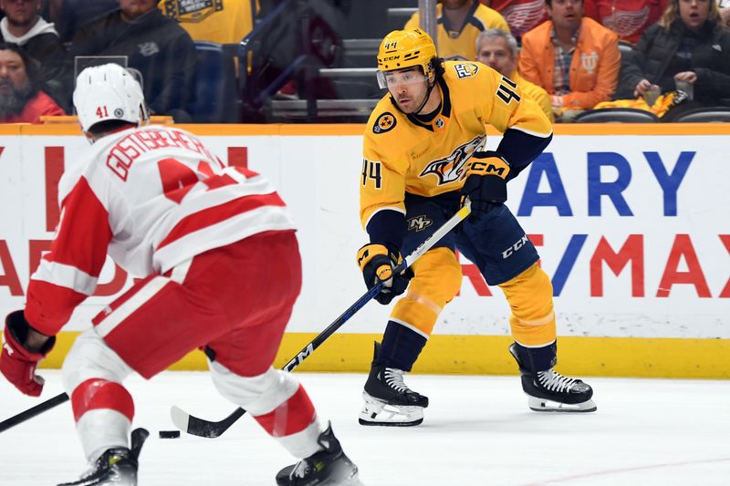 Mar 23, 2024; Nashville, Tennessee, USA; Nashville Predators left wing Kiefer Sherwood (44) skates the puck into the offensive zone during the first period against the Detroit Red Wings at Bridgestone Arena. Mandatory Credit: Christopher Hanewinckel-USA TODAY Sports