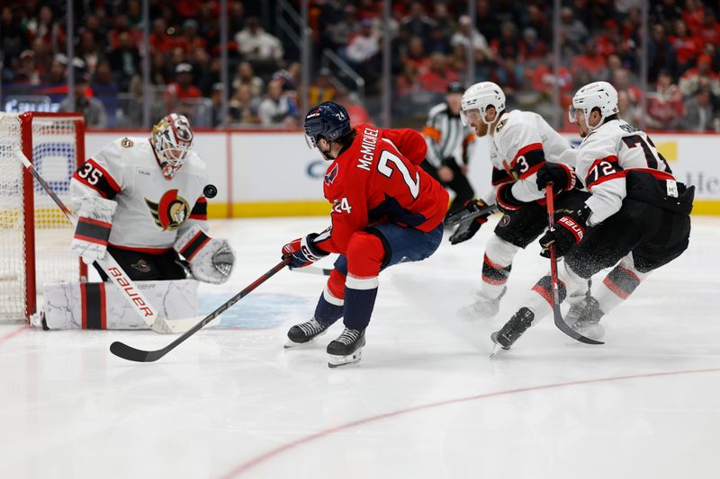 Mar 3, 2025; Washington, District of Columbia, USA; Washington Capitals center Connor McMichael (24) shoots the puck on Ottawa Senators goaltender Linus Ullmark (35) in the third period at Capital One Arena. Mandatory Credit: Geoff Burke-Imagn Images