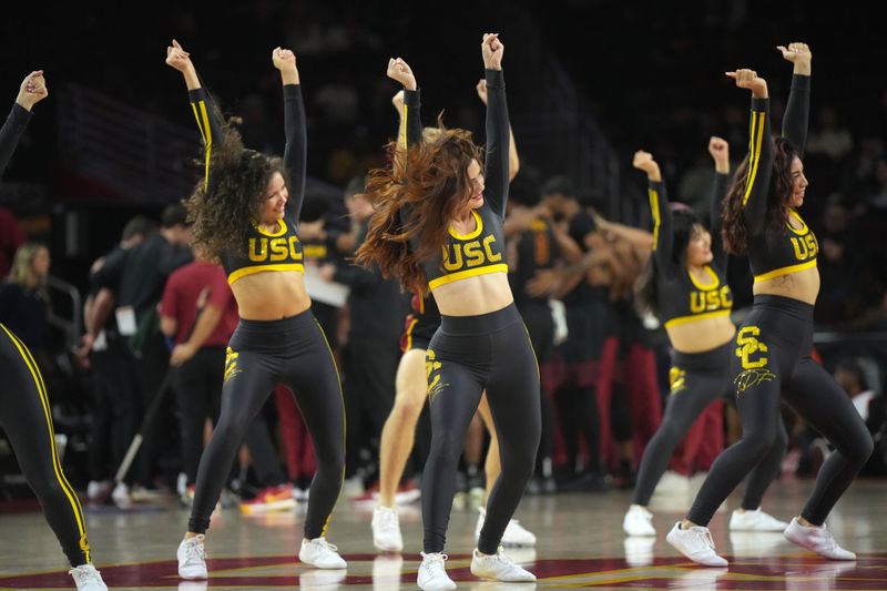 Dec 4, 2024; Los Angeles, California, USA; Southern California Trojans dance force team cheerleaders perform during the game against the Oregon Ducks at Galen Center. Mandatory Credit: Kirby Lee-Imagn ImagesDec 4, 2024; Los Angeles, California, USA; at Galen Center. Mandatory Credit: Kirby Lee-Imagn Images