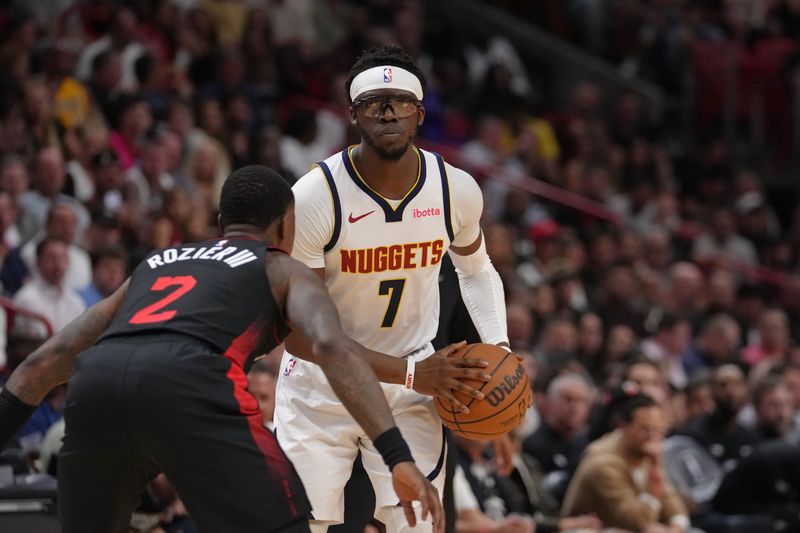 MIAMI, FL - MARCH 13: Reggie Jackson #7 of the Denver Nuggets handles the ball during the game against the Miami Heat on March 13, 2024 at Kaseya Center in Miami, Florida. NOTE TO USER: User expressly acknowledges and agrees that, by downloading and or using this Photograph, user is consenting to the terms and conditions of the Getty Images License Agreement. Mandatory Copyright Notice: Copyright 2024 NBAE (Photo by Eric Espada/NBAE via Getty Images)