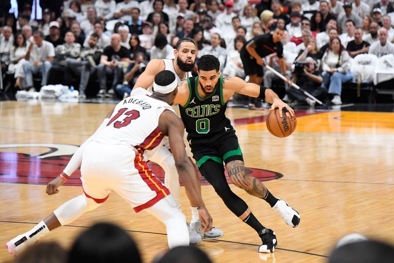 MIAMI, FL - APRIL 27: Jayson Tatum #0 of the Boston Celtics drives to the basket during the game against the Miami Heat during Round 1 Game 3 of the 2024 NBA Playoffs on April 27, 2024 at Kaseya Center in Miami, Florida. NOTE TO USER: User expressly acknowledges and agrees that, by downloading and or using this Photograph, user is consenting to the terms and conditions of the Getty Images License Agreement. Mandatory Copyright Notice: Copyright 2024 NBAE (Photo by Brian Babineau/NBAE via Getty Images)