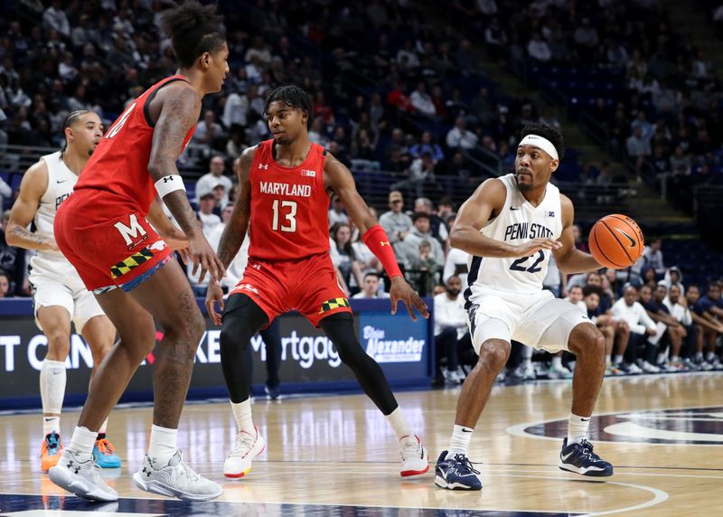 Mar 5, 2023; University Park, Pennsylvania, USA; Penn State Nittany Lions guard Jalen Pickett (22) dribbles the ball as Maryland Terrapins forward Julian Reese (10) defends during the first half at Bryce Jordan Center. Mandatory Credit: Matthew OHaren-USA TODAY Sports
