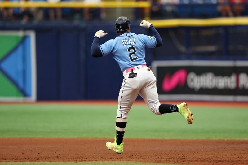 Jul 9, 2023; St. Petersburg, Florida, USA;  Tampa Bay Rays designated hitter Yandy Diaz (2) runs the bases after hitting a two run home run against the Atlanta Braves in the fourth inning at Tropicana Field. Mandatory Credit: Nathan Ray Seebeck-USA TODAY Sports