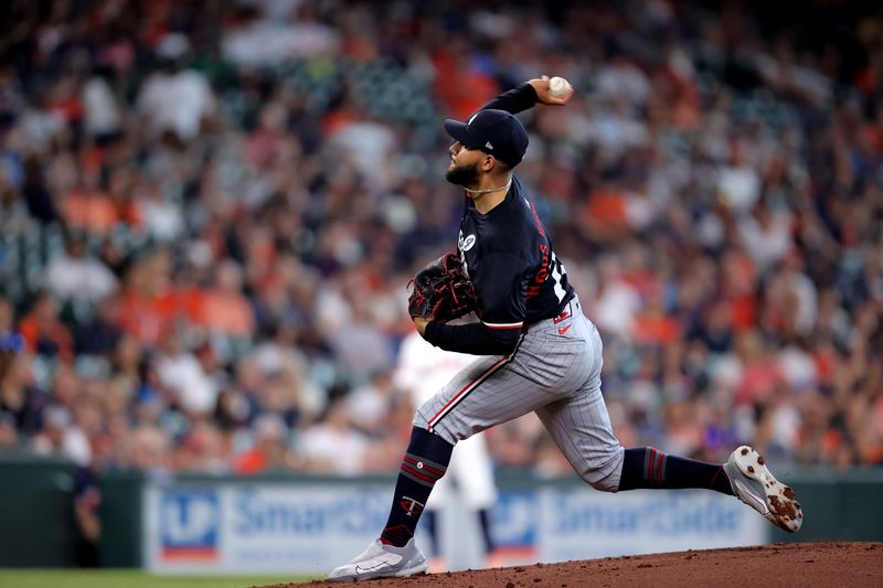 Jun 2, 2024; Houston, Texas, USA; Minnesota Twins starting pitcher Simeon Woods Richardson (78) delivers a pitch against the Houston Astros during the first inning at Minute Maid Park. Mandatory Credit: Erik Williams-USA TODAY Sports