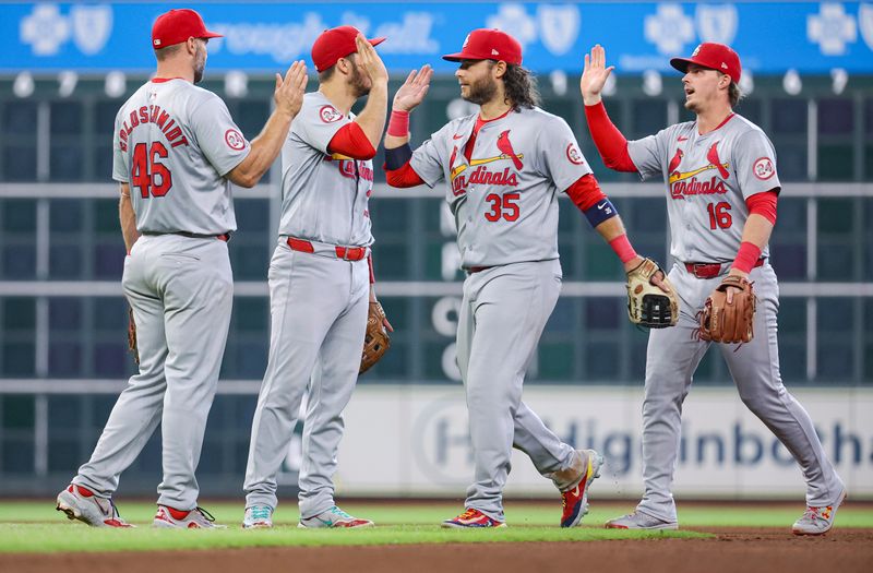 Jun 5, 2024; Houston, Texas, USA; St. Louis Cardinals players celebrate after the game against the Houston Astros at Minute Maid Park. Mandatory Credit: Troy Taormina-USA TODAY Sports