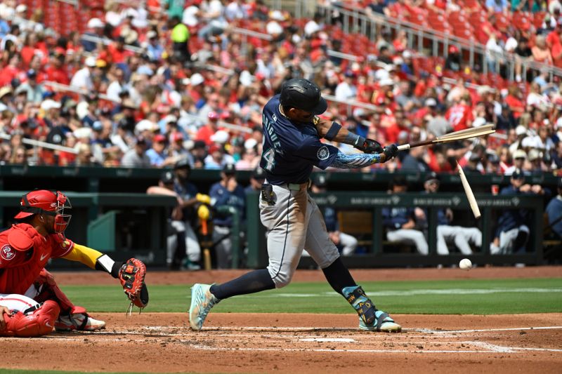 Sep 8, 2024; St. Louis, Missouri, USA; Seattle Mariners center fielder Julio Rodriguez (44) breaks his bat during an at bat against the St. Louis Cardinals during the second inning at Busch Stadium. Mandatory Credit: Jeff Le-Imagn Images