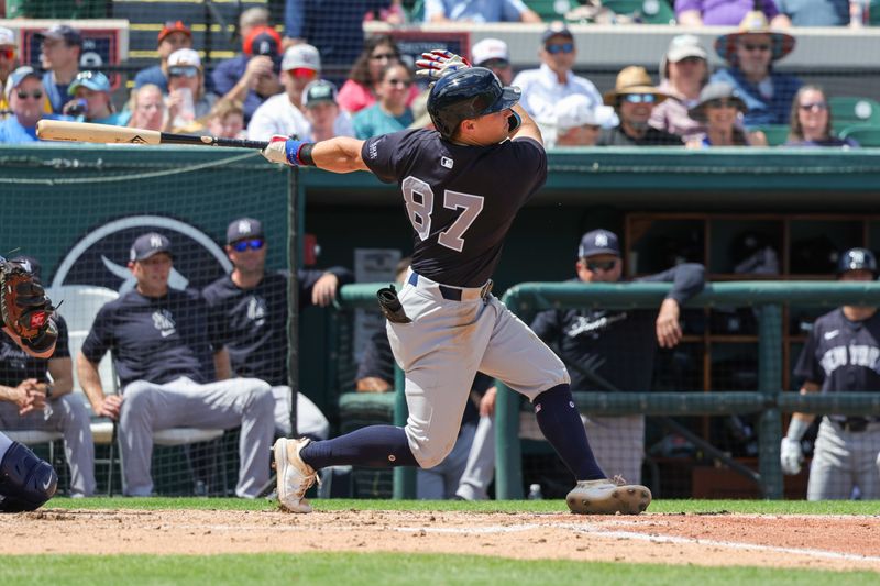 Mar 23, 2024; Lakeland, Florida, USA; New York Yankees third baseman Caleb Durbin (87) bats during the third inning against the Detroit Tigers at Publix Field at Joker Marchant Stadium. Mandatory Credit: Mike Watters-USA TODAY Sports