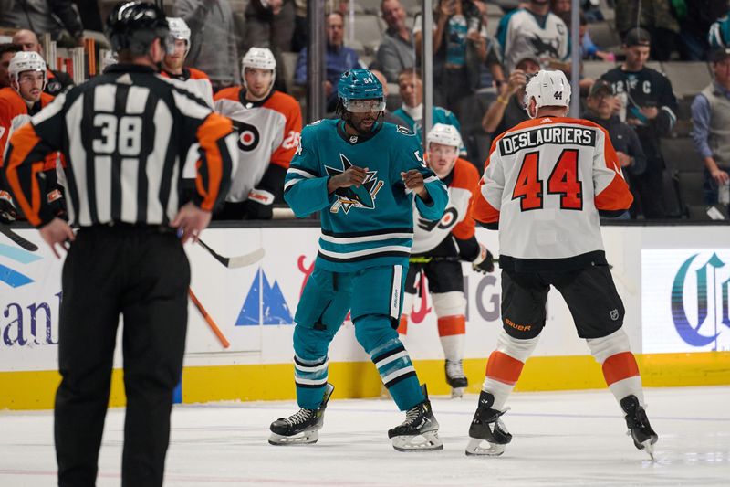 Nov 7, 2023; San Jose, California, USA; San Jose Sharks right wing Givani Smith (54) and Philadelphia Flyers left wing Nicolas Deslauriers (44) prepare to fight during the first period at SAP Center at San Jose. Mandatory Credit: Robert Edwards-USA TODAY Sports