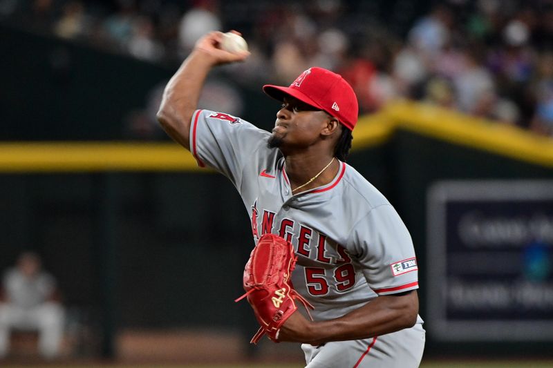 Jun 12, 2024; Phoenix, Arizona, USA; Los Angeles Angels pitcher Jose Soriano (59) throws in the fourth inning against the Arizona Diamondbacks at Chase Field. Mandatory Credit: Matt Kartozian-USA TODAY Sports