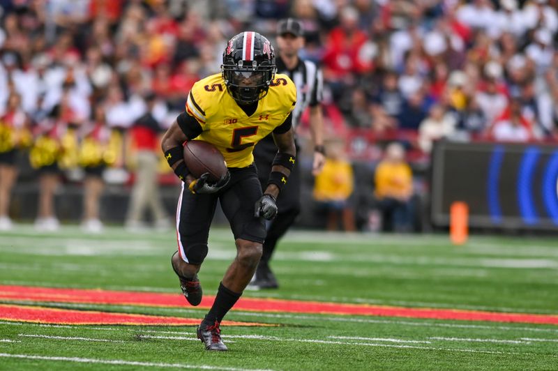 Nov 4, 2023; College Park, Maryland, USA; Maryland Terrapins wide receiver Octavian Smith Jr. (5) runs after the catch during the second half against the Penn State Nittany Lions  at SECU Stadium. Mandatory Credit: Tommy Gilligan-USA TODAY Sports