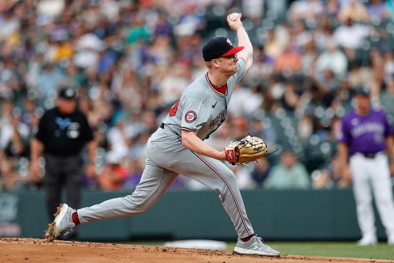 Jun 21, 2024; Denver, Colorado, USA; Washington Nationals starting pitcher DJ Herz (74) pitches in the first inning against the Colorado Rockies at Coors Field. Mandatory Credit: Isaiah J. Downing-USA TODAY Sports