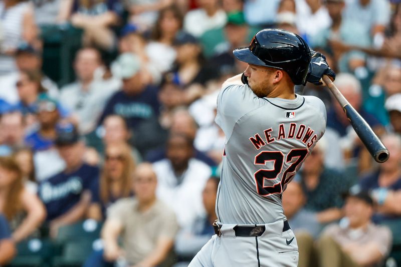 Aug 8, 2024; Seattle, Washington, USA; Detroit Tigers center fielder Parker Meadows (22) hits an RBI-double against the Seattle Mariners during the fifth inning at T-Mobile Park. Mandatory Credit: Joe Nicholson-USA TODAY Sports