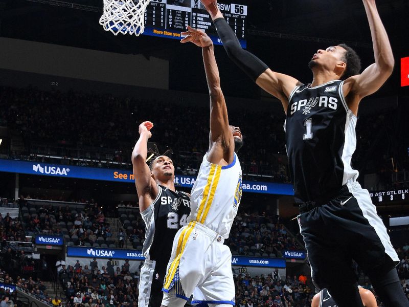 SAN ANTONIO, TX - MARCH 11:  Victor Wembanyama #1 of the San Antonio Spurs grabs a rebound during the game against the Golden State Warriors on March 11, 2024 at the Frost Bank Center in San Antonio, Texas. NOTE TO USER: User expressly acknowledges and agrees that, by downloading and or using this photograph, user is consenting to the terms and conditions of the Getty Images License Agreement. Mandatory Copyright Notice: Copyright 2024 NBAE (Photos by Michael Gonzales/NBAE via Getty Images)