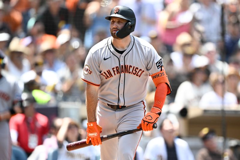Aug 21, 2025; San Diego, California, USA; San Francisco Giants third baseman Casey Schmitt (10) holds the bat after hitting a fly ball during the second inning against the San Diego Padres at Petco Park. Mandatory Credit: Denis Poroy-Imagn Images