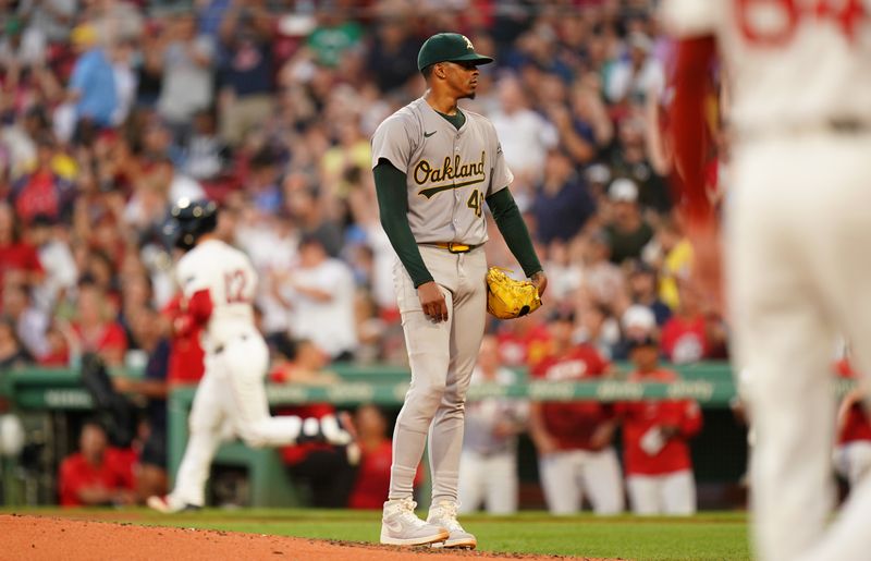 Jul 11, 2024; Boston, Massachusetts, USA; Oakland Athletics starting pitcher Luis Medina (46) looks on as Boston Red Sox catcher Connor Wong (12) hits a home run in the third inning at Fenway Park. Mandatory Credit: David Butler II-USA TODAY Sports