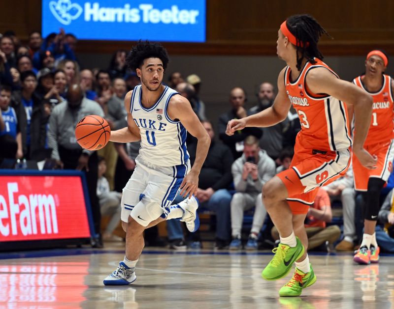 Jan 2, 2024; Durham, North Carolina, USA;  Duke Blue Devils guard Jared McCain (0) dribbles up court as Syracuse Orange forward Benny Williams (13) defends during the second half at Cameron Indoor Stadium.  The Blue Devils won 86-66. Mandatory Credit: Rob Kinnan-USA TODAY Sports