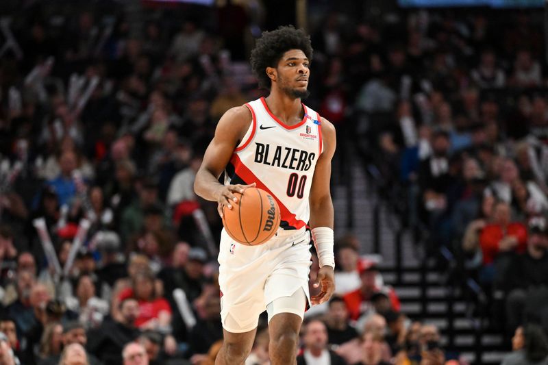 PORTLAND, OREGON - OCTOBER 18: Scoot Henderson #00 of the Portland Trail Blazers dribbles during the third quarter of the preseason game against the Utah Jazz at Moda Center on October 18, 2024 in Portland, Oregon. NOTE TO USER: User expressly acknowledges and agrees that, by downloading and or using this photograph, User is consenting to the terms and conditions of the Getty Images License Agreement. (Photo by Alika Jenner/Getty Images)