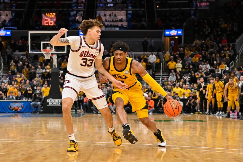 Dec 22, 2022; St. Louis, Missouri, USA;  Missouri Tigers guard DeAndre Gholston (4) drives to the basket as Illinois Fighting Illini forward Coleman Hawkins (33) defends during the first half at Enterprise Center. Mandatory Credit: Jeff Curry-USA TODAY Sports