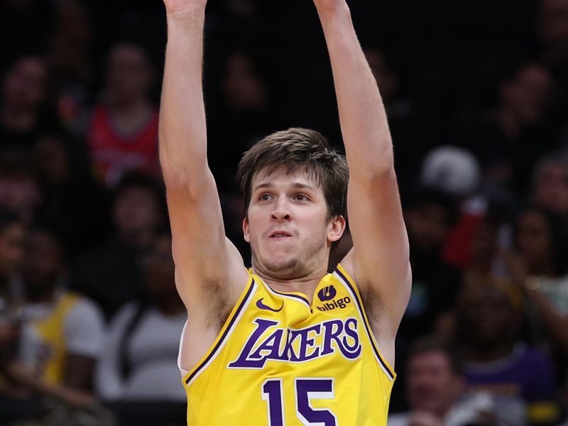 WASHINGTON, DC - APRIL 03: Austin Reaves #15 of the Los Angeles Lakers shoots the ball against the Washington Wizards during the first half at Capital One Arena on April 03, 2024 in Washington, DC. NOTE TO USER: User expressly acknowledges and agrees that, by downloading and or using this photograph, User is consenting to the terms and conditions of the Getty Images License Agreement. (Photo by Patrick Smith/Getty Images)