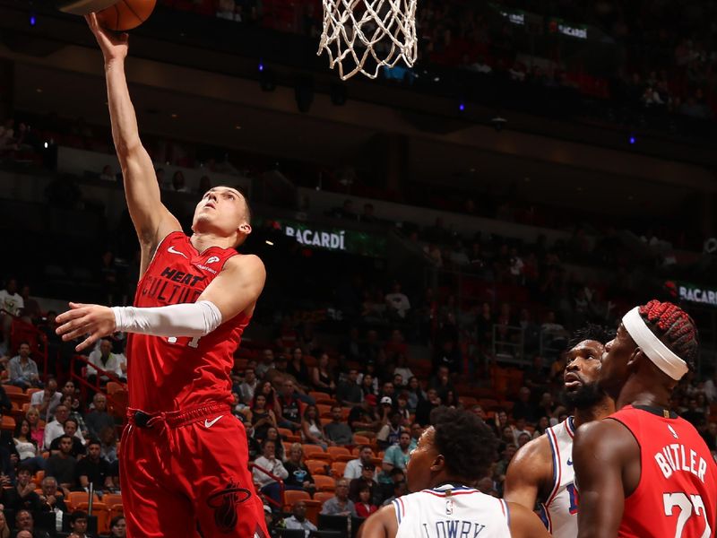 MIAMI, FL - NOVEMBER 18: Tyler Herro #14 of the Miami Heat drives to the basket during the game Philadelphia 76ers on November 18, 2024 at Kaseya Center in Miami, Florida. NOTE TO USER: User expressly acknowledges and agrees that, by downloading and or using this Photograph, user is consenting to the terms and conditions of the Getty Images License Agreement. Mandatory Copyright Notice: Copyright 2024 NBAE (Photo by Issac Baldizon/NBAE via Getty Images)