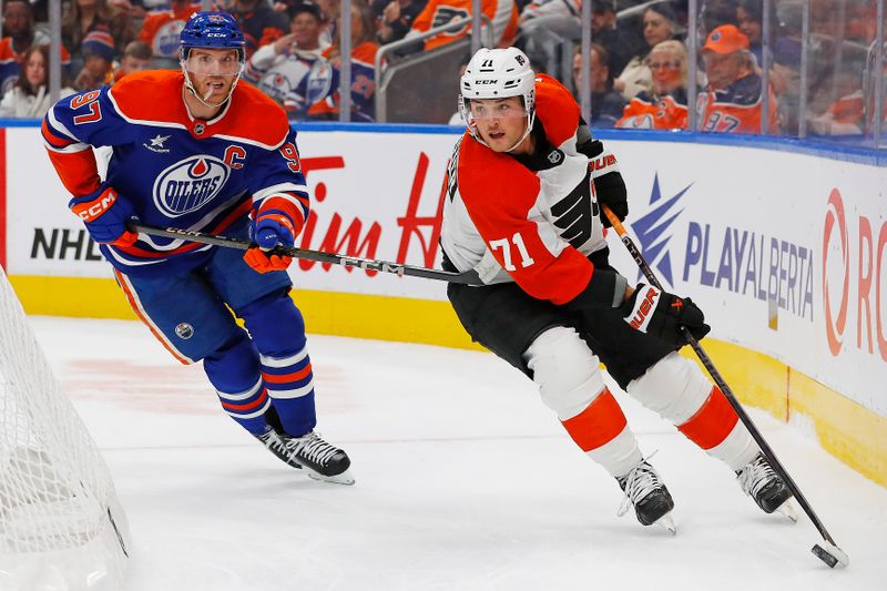 Oct 15, 2024; Edmonton, Alberta, CAN; Philadelphia Flyers forward Tyson Foerster (71) looks to make a pass in front of Edmonton Oilers forward Connor McDavid (97) during the second period at Rogers Place. Mandatory Credit: Perry Nelson-Imagn Images