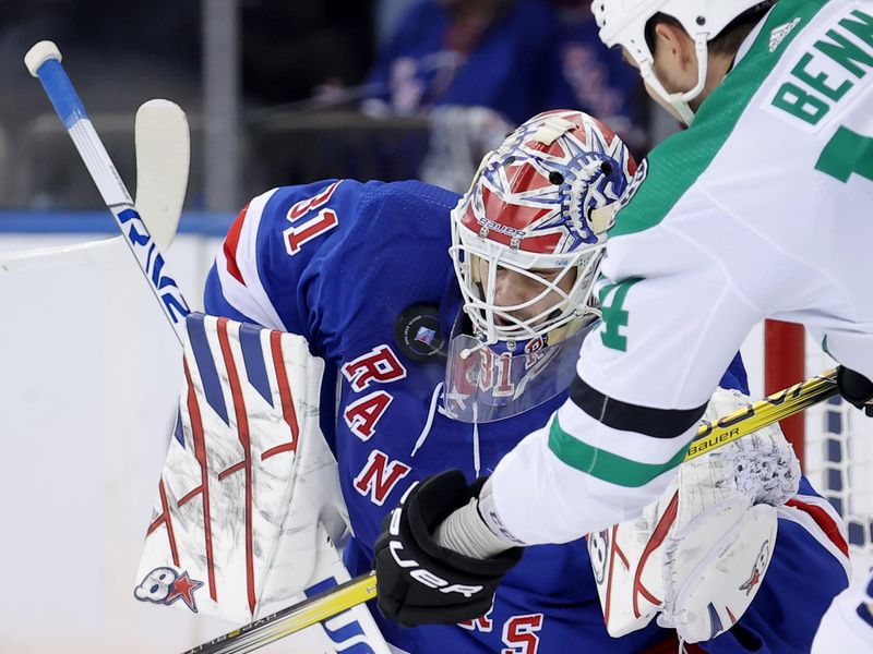 Feb 20, 2024; New York, New York, USA; New York Rangers goaltender Igor Shesterkin (31) makes a save in front of Dallas Stars left wing Jamie Benn (14) during the second period at Madison Square Garden. Mandatory Credit: Brad Penner-USA TODAY Sports