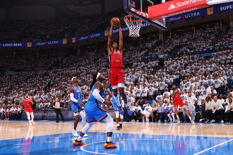 OKLAHOMA CITY, OK - APRIL 24: Herb Jones #5 of the New Orleans Pelicans dunks the ball during the game against the Oklahoma City Thunder during Round 1 Game 2 of the 2024 NBA Playoffs on April 24, 2024 at Paycom Arena in Oklahoma City, Oklahoma. NOTE TO USER: User expressly acknowledges and agrees that, by downloading and or using this photograph, User is consenting to the terms and conditions of the Getty Images License Agreement. Mandatory Copyright Notice: Copyright 2024 NBAE (Photo by Zach Beeker/NBAE via Getty Images)