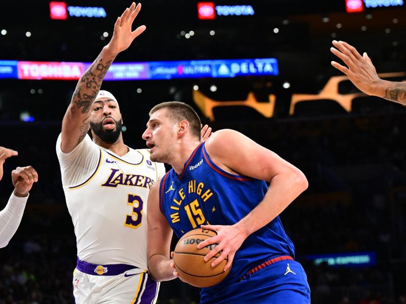 LOS ANGELES, CA - MARCH 2: Nikola Jokic #15 of the Denver Nuggets drives to the basket during the game against the Los Angeles Lakers on March 2, 2024 at Crypto.Com Arena in Los Angeles, California. NOTE TO USER: User expressly acknowledges and agrees that, by downloading and/or using this Photograph, user is consenting to the terms and conditions of the Getty Images License Agreement. Mandatory Copyright Notice: Copyright 2024 NBAE (Photo by Adam Pantozzi/NBAE via Getty Images)