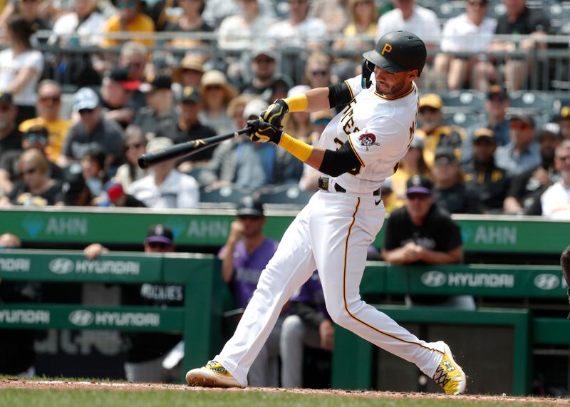 May 10, 2023; Pittsburgh, Pennsylvania, USA;  Pittsburgh Pirates second baseman Tucupita Marcano (30) hits a solo home run against the Colorado Rockies during the second inning at PNC Park. Mandatory Credit: Charles LeClaire-USA TODAY Sports