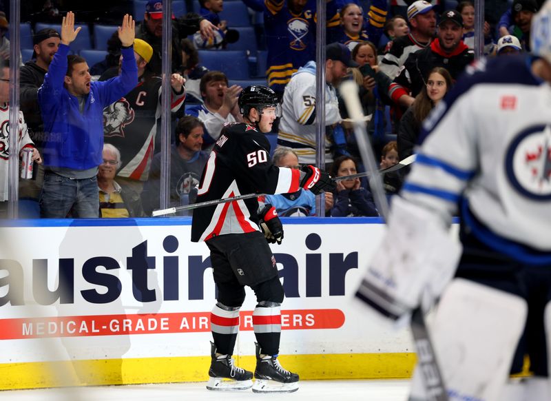 Mar 3, 2024; Buffalo, New York, USA;  Buffalo Sabres left wing Eric Robinson (50) reacts after scoring a goal during the second period against the Winnipeg Jets at KeyBank Center. Mandatory Credit: Timothy T. Ludwig-USA TODAY Sports