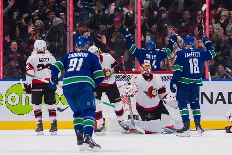 Jan 2, 2024; Vancouver, British Columbia, CAN; Ottawa Senators forward Claude Giroux (28) and defenseman Travis Hamonic (23) and goalie Anton Forsberg (31) and Vancouver Canucks forward Sam Lafferty (18) all watch forward Pius Suter (24) celebrate his goal in the first period at Rogers Arena. Mandatory Credit: Bob Frid-USA TODAY Sports