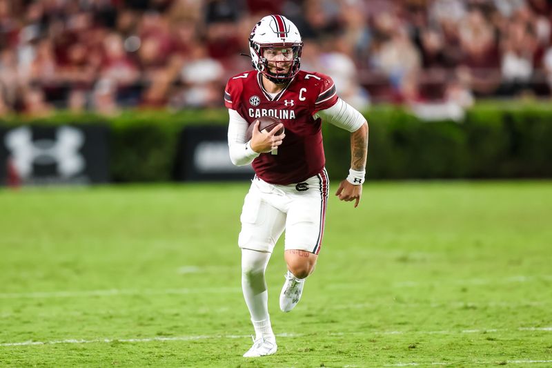 Sep 23, 2023; Columbia, South Carolina, USA; South Carolina Gamecocks quarterback Spencer Rattler (7) scrambles against the Mississippi State Bulldogs in the second half at Williams-Brice Stadium. Mandatory Credit: Jeff Blake-USA TODAY Sports