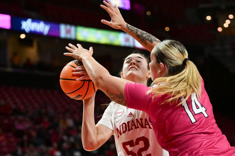 Jan 31, 2024; College Park, Maryland, USA;  Indiana Hoosiers forward Lilly Meister (52) reacts after being fouled by Maryland Terrapins forward Allie Kubek (14) during the first half at Xfinity Center. Mandatory Credit: Tommy Gilligan-USA TODAY Sports