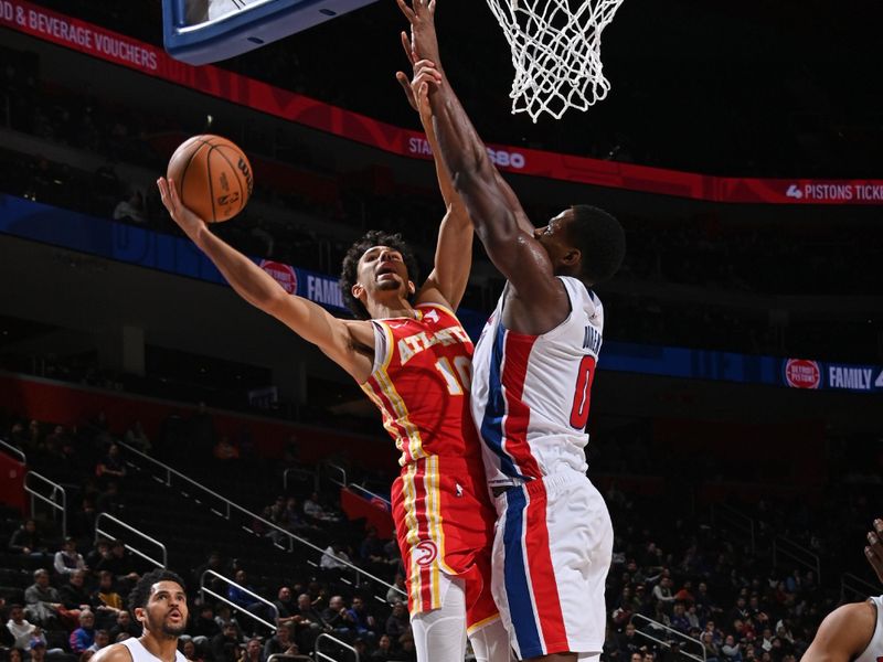 DETROIT, MI - FEBRUARY 3: Zaccharie Risacher #10 of the Atlanta Hawks drives to the basket during the game against the Detroit Pistons   on February 3, 2025 at Little Caesars Arena in Detroit, Michigan. NOTE TO USER: User expressly acknowledges and agrees that, by downloading and/or using this photograph, User is consenting to the terms and conditions of the Getty Images License Agreement. Mandatory Copyright Notice: Copyright 2025 NBAE (Photo by Chris Schwegler/NBAE via Getty Images)