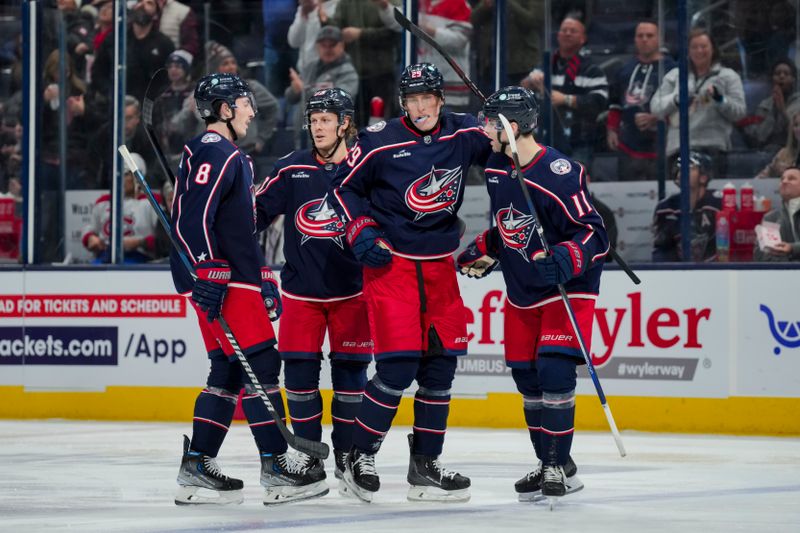 Nov 29, 2023; Columbus, Ohio, USA;  Columbus Blue Jackets right wing Patrik Laine (29) celebrates with teammates after scoring a goal against the Montreal Canadiens in the second period at Nationwide Arena. Mandatory Credit: Aaron Doster-USA TODAY Sports