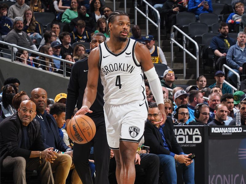 INDIANAPOLIS, IN - MARCH 16: Dennis Smith Jr. #4 of the Brooklyn Nets dribbles the ball during the game against the Indiana Pacers on March 16, 2024 at Gainbridge Fieldhouse in Indianapolis, Indiana. NOTE TO USER: User expressly acknowledges and agrees that, by downloading and or using this Photograph, user is consenting to the terms and conditions of the Getty Images License Agreement. Mandatory Copyright Notice: Copyright 2024 NBAE (Photo by Ron Hoskins/NBAE via Getty Images)