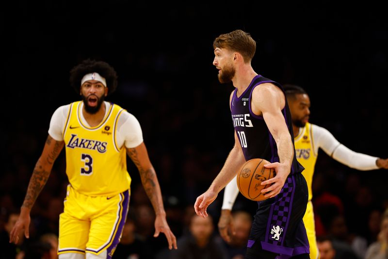 LOS ANGELES, CALIFORNIA - NOVEMBER 15:   Domantas Sabonis #10 of the Sacramento Kings at Crypto.com Arena on November 15, 2023 in Los Angeles, California.  NOTE TO USER: User expressly acknowledges and agrees that, by downloading and/or using this photograph, user is consenting to the terms and conditions of the Getty Images License Agreement. (Photo by Ronald Martinez/Getty Images)