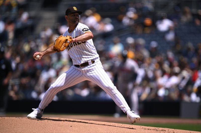 Apr 19, 2023; San Diego, California, USA; San Diego Padres starting pitcher Nick Martinez (21) throws a pitch against the Atlanta Braves during the first inning at Petco Park. Mandatory Credit: Orlando Ramirez-USA TODAY Sports