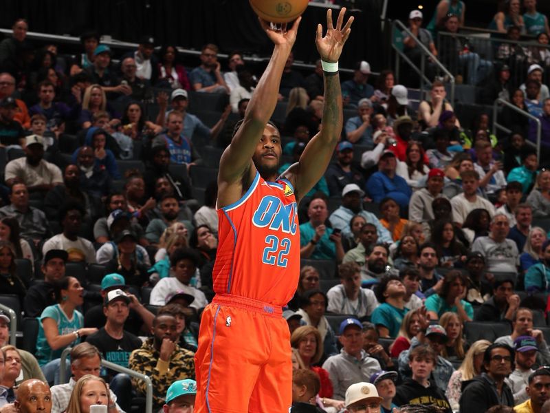 CHARLOTTE, NC - APRIL 7: Cason Wallace #22 of the Oklahoma City Thunder  shoots the ball during the game against the Charlotte Hornets on April 7, 2024 at Spectrum Center in Charlotte, North Carolina. NOTE TO USER: User expressly acknowledges and agrees that, by downloading and or using this photograph, User is consenting to the terms and conditions of the Getty Images License Agreement. Mandatory Copyright Notice: Copyright 2024 NBAE (Photo by Kent Smith/NBAE via Getty Images)