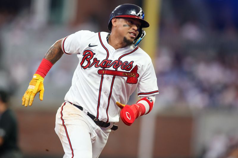 Aug 14, 2023; Atlanta, Georgia, USA; Atlanta Braves shortstop Orlando Arcia (11) rounds third against the New York Yankees in the third inning at Truist Park. Mandatory Credit: Brett Davis-USA TODAY Sports
