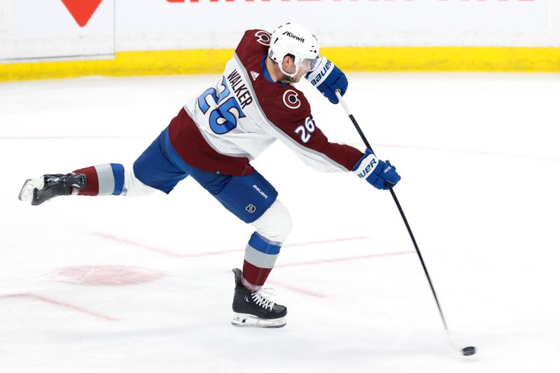 Apr 21, 2024; Winnipeg, Manitoba, CAN; Colorado Avalanche defenseman Sean Walker (26) warms up before a game against the Winnipeg Jets in game one of the first round of the 2024 Stanley Cup Playoffs at Canada Life Centre. Mandatory Credit: James Carey Lauder-USA TODAY Sports