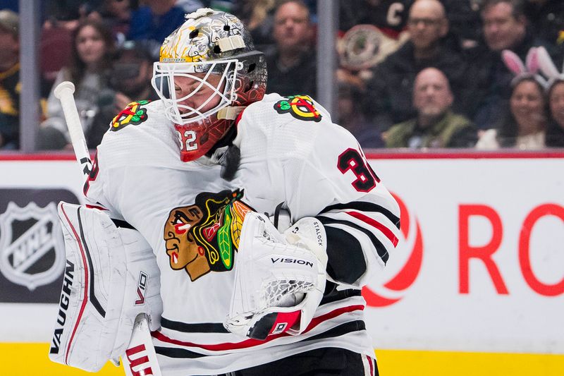 Apr 6, 2023; Vancouver, British Columbia, CAN; Chicago Blackhawks goalie Alex Stalock (32) makes a save against the Vancouver Canucks in the third period at Rogers Arena. Canucks won 3-0. Mandatory Credit: Bob Frid-USA TODAY Sports