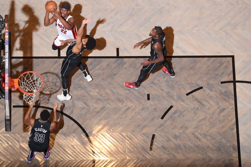 BROOKLYN, NY - JANUARY 15: Jimmy Butler #22 of the Miami Heat shoots the ball during the game against the Brooklyn Nets on January 15, 2024 at Barclays Center in Brooklyn, New York. NOTE TO USER: User expressly acknowledges and agrees that, by downloading and or using this Photograph, user is consenting to the terms and conditions of the Getty Images License Agreement. Mandatory Copyright Notice: Copyright 2024 NBAE (Photo by Nathaniel S. Butler/NBAE via Getty Images)